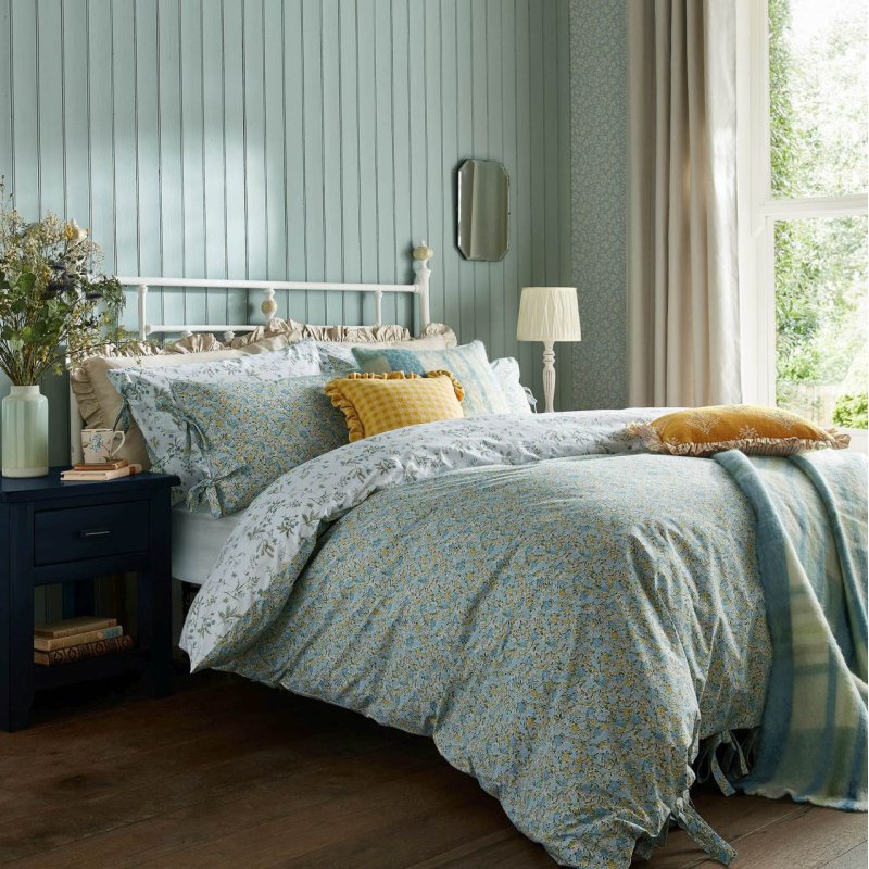 Laura Ashley Loveston Blue Duvet Cover Set lifestyle image of the bed