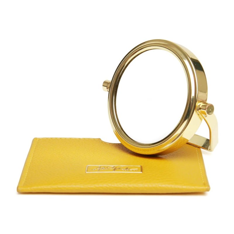 Alice Wheeler Ochre Mirror And Pouch image of the mirror and pouch on a white background