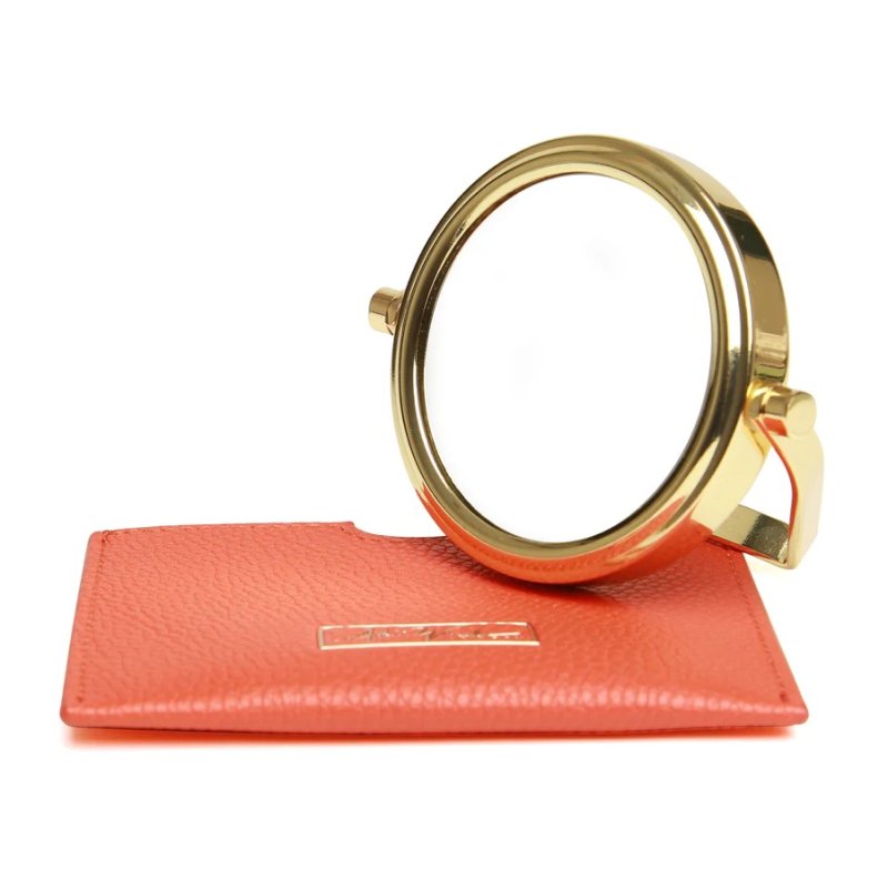 Alice Wheeler Orange Mirror And Pouch image of the mirror and pouch on a white background
