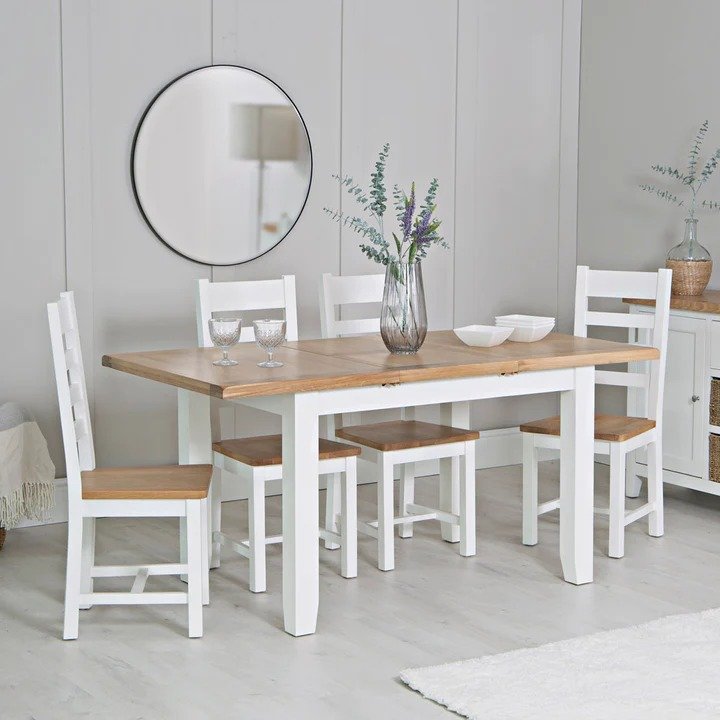 Derwent White 1.2m Extendable Table With 4 Wooden Ladder Back Chairs lifestyle image of the dining set