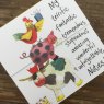 Alex Clark Farmyard Animals Acrobats Magnetic Notepad close up of front on a wooden table