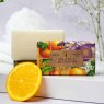 The English Soap Company Anniversary Orange Blossom Soap soap and packaging next to eachother lifestyle