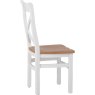 Derwent White Wooden Cross Back Chair side angle of the chair on a white background