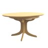 Warwick Oak Round Crown Dining Table different angle of the table on a white background