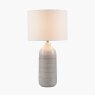 Venus Blue and Grey Ombre Ceramic Table Lamp image of the lamp turned on on a white background