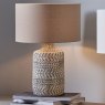 Atouk Textured Stoneware Lamp with Natural Linen Shade lifestyle image of the lamp