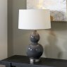 Gatsby Grey Ceramic Table Lamp with Brushed Silver Metal Detail lifestyle image of the lamp