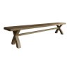 Heritage 2.5m Cross Legged Dining Bench angled image of the bench on a white background