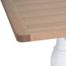 Holkham Oak 1.6m Extending Table close up image of the corner of the dining table on a white background