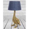 Antique Gold Goose Table Lamp With Grey Shade On a white wooden surface