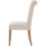 Button Back Scroll Top Dining Chair In Natural side on image of the chair on a white background