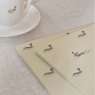 Sophie Allport Set Of 4 Hare Placemats lifestyle image of the placemats
