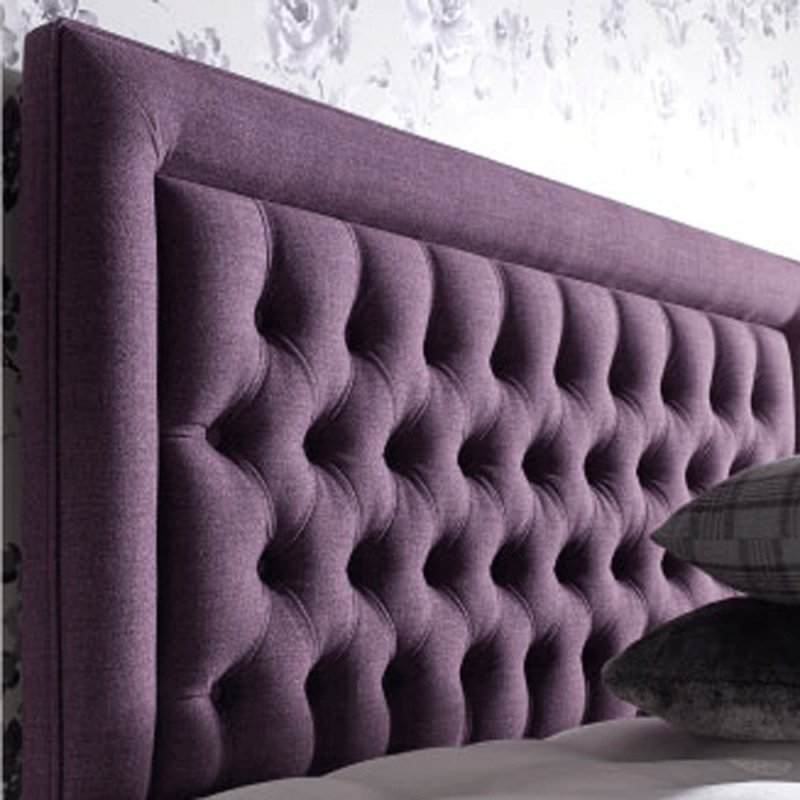Purple upholstered store headboard