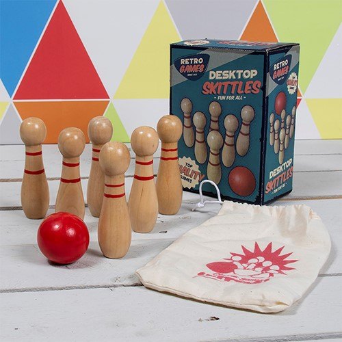 The Retro Games Skittles with box on a coloured background