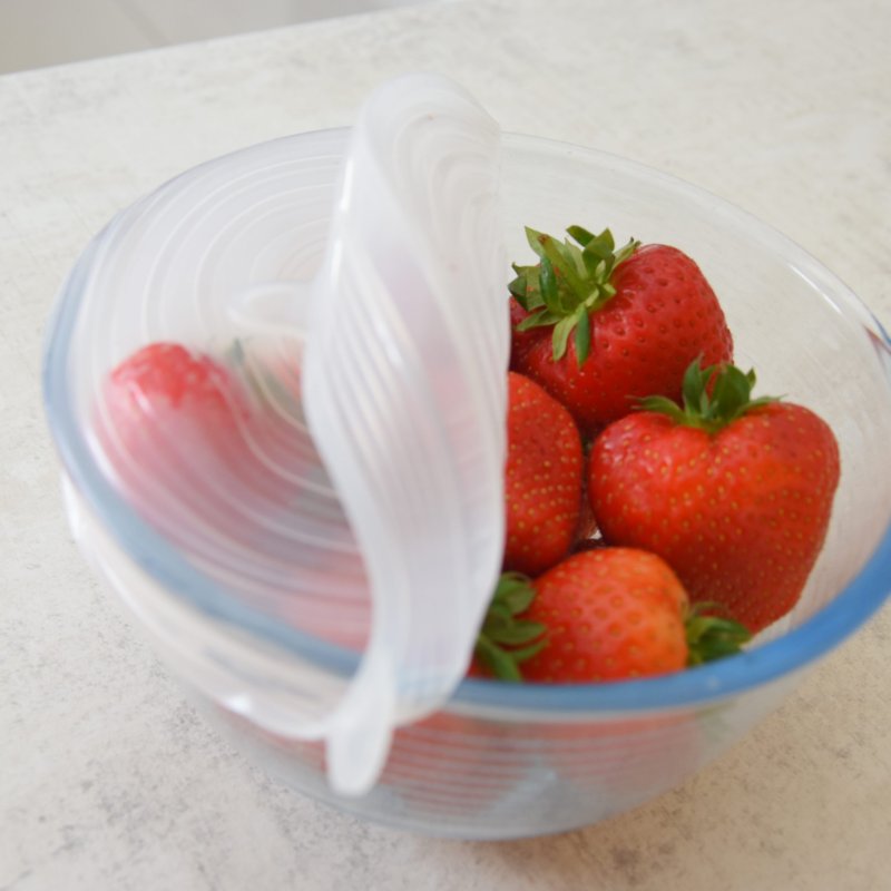 Neat Ideas Stretch 'n' Fresh covering a bowl of strawberries