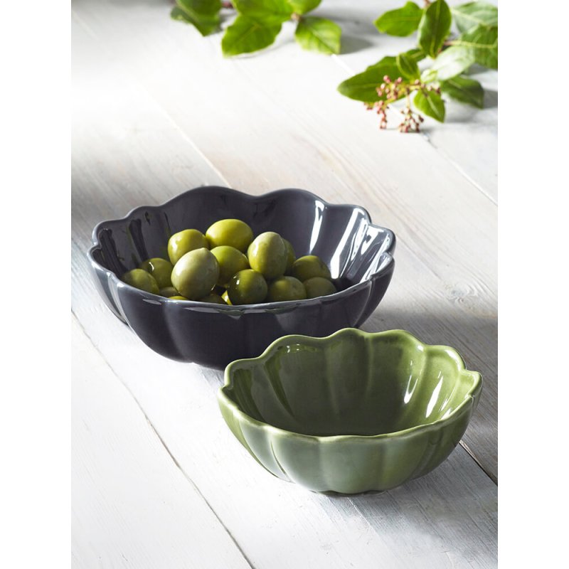 M.M Living Green Scalloped Small Dip bowl on a dining table next to a bowl of olives