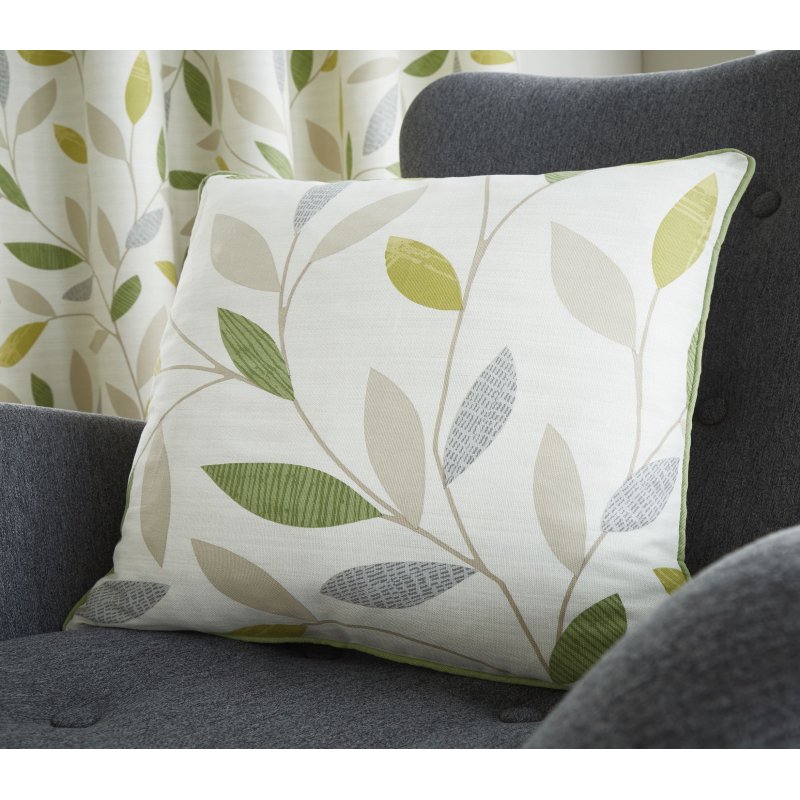 Fusion Beechwood Green Filled Cushion placed on a sofa