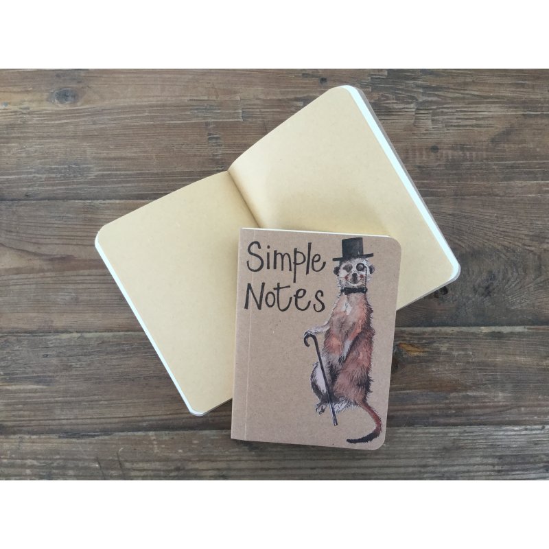 Alex Clark Meerkat Small Kraft Notebook open on a wooden table