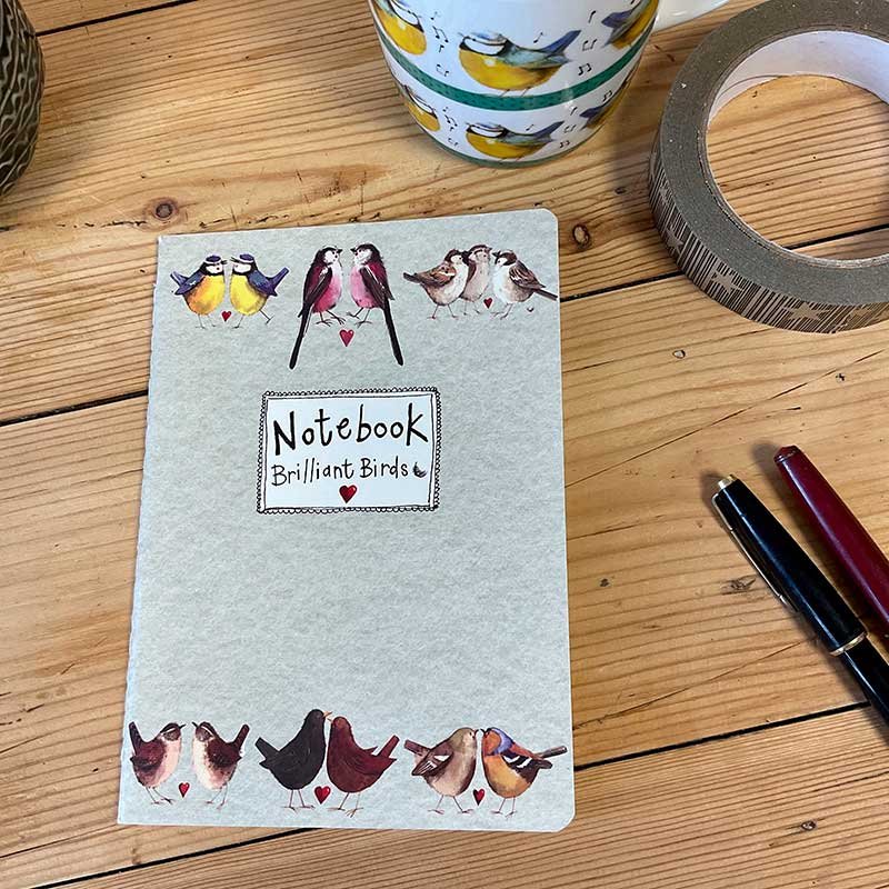 Alex Clark Brilliaant Birds Medium Soft Notebook on a wooden table