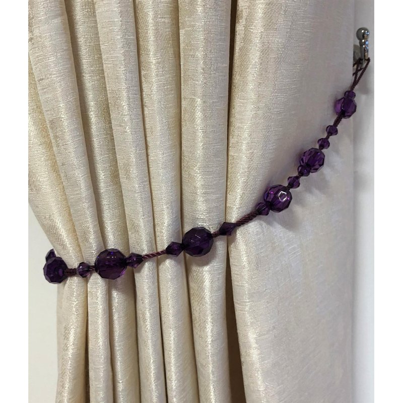 Twinkle Tie Back Pair Amethyst being used to hold back a curtain