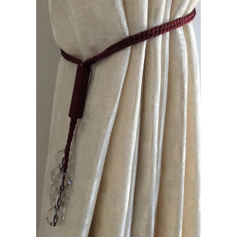 Tsar Burgundy Tiebacks being used to hold back a curtain