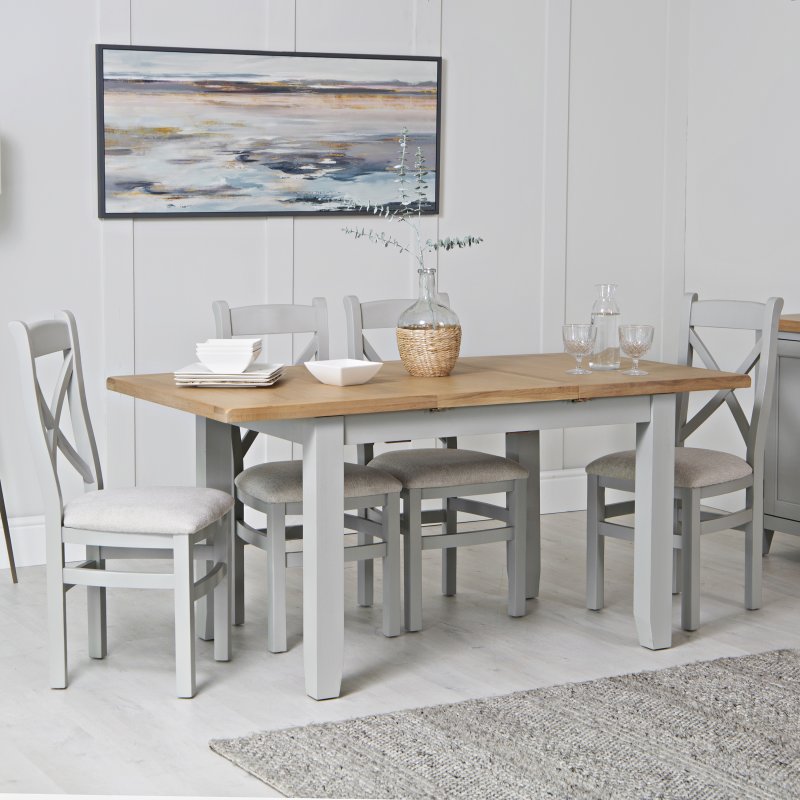 Derwent Grey 1.2m Table and 6 Fabric Cross Back Chairs lifestyle image with the table and chairs