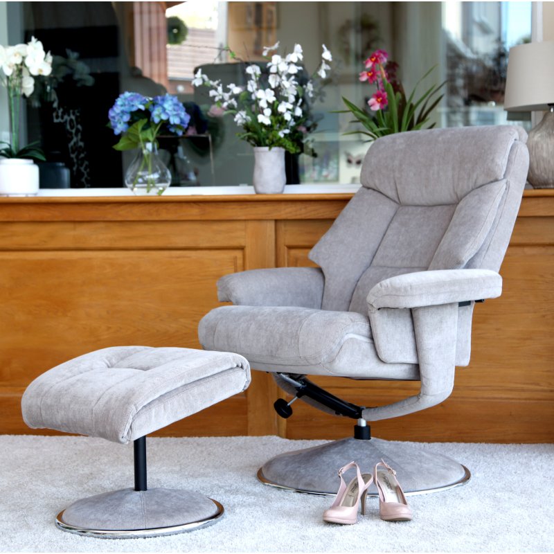 Biarritz Mist Fabric Swivel Chair and Foot Stool lifestyle image of the chair and foot stool