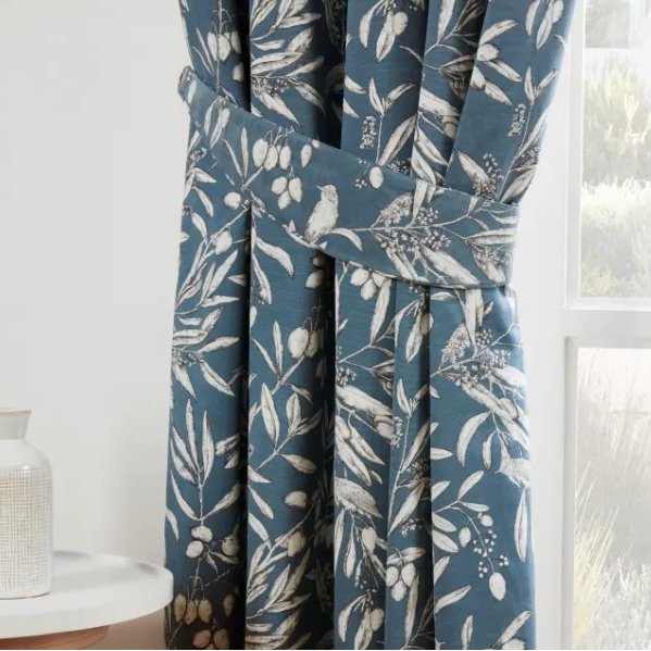 Sundour Aviary Bluebell Curtain Tie Backs lifestyle close up image of the curtain tie backs