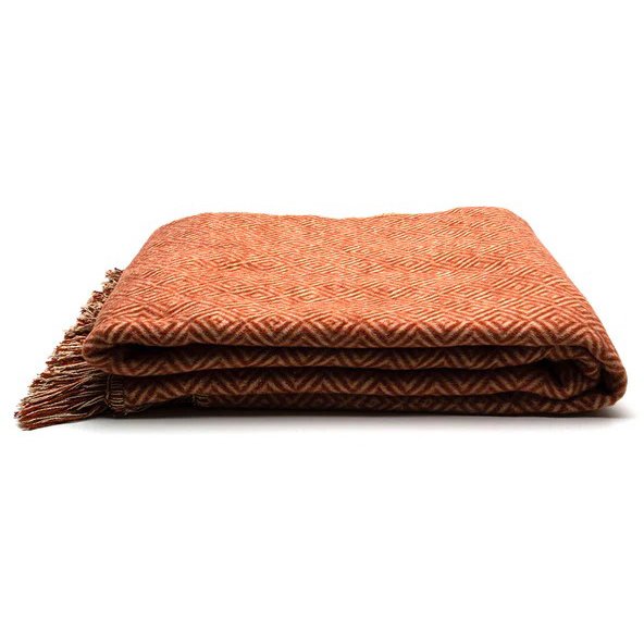 Biederlack Cotton Rich Diamond Rust Fringe Throw image of the throw folded on a white background
