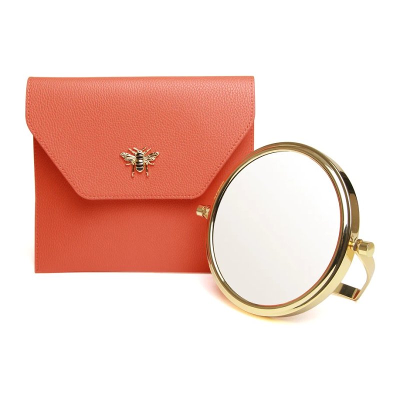 Alice Wheeler Orange Luxury Travel Mirror And Case image of the mirror and case on a white background