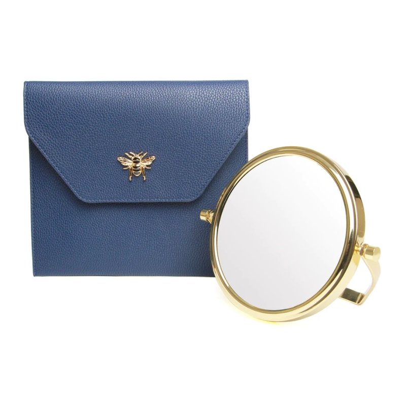 Alice Wheeler Navy Luxury Travel Mirror And Case image of the mirror and case on a white background