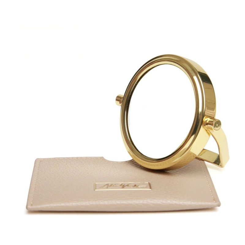 Alice Wheeler Stone Mirror And Pouch image of the mirror and pouch on a white background