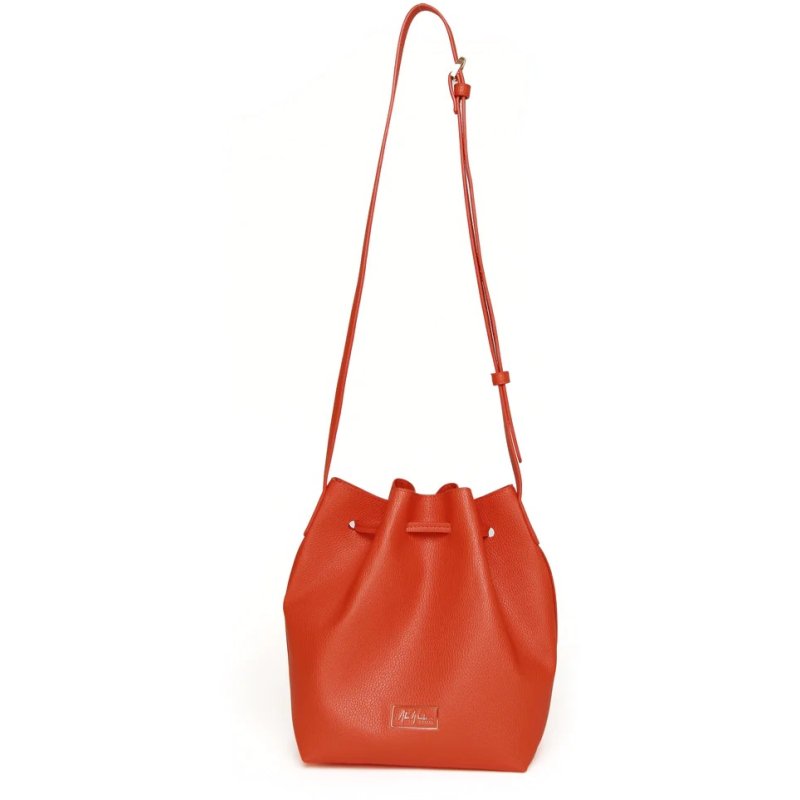 Alice Wheeler Orange Bucket Cross Body Bag image of the bag on a white background