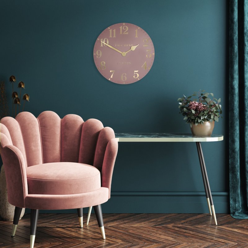 Thomas Kent Arabic 12" Blush Pink Wall Clock lifestyle image of the clock