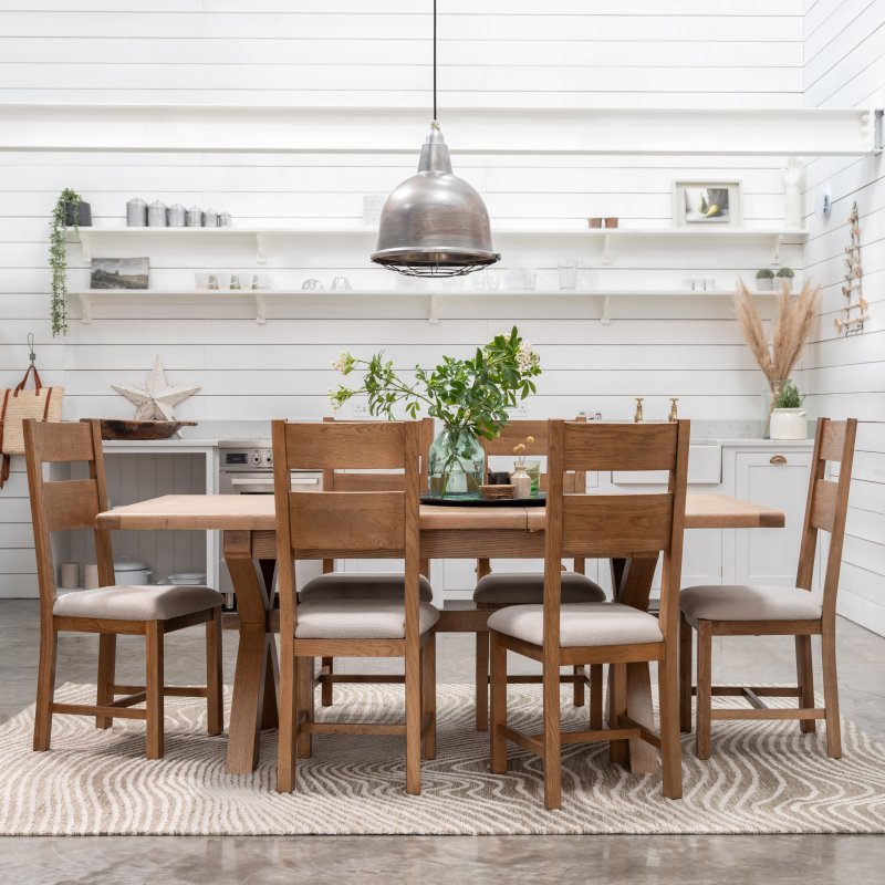 Manor Oak 1.3m Extending Crossed Leg Dining Table With 6 Ladder Back Chairs lifestyle image