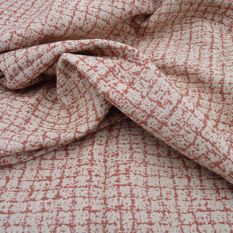 Close up of the rippled Tulsa fabric in Coral