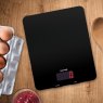 Salter Black High Capacity Glass Digital Kitchen Scale on a wooden table