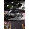 M.M Living Bobble Grey Side Plate on a dining table layered with a dinner plate and cereal bowl