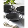 M.M Living Bobble Grey Pasta Bowl on a dining table with other pasta bowls