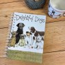 Alex Clark Delightful Dogs Spiral Journal on a wooden table