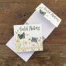 Alex Clark Field Notes Butterflies Mini Magnetic Notepad front and inside on a wooden table