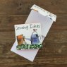 Alex Clark Growing Ideas Watering Can Mini Magnetic Notepad front and inside on a wooden table