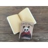 Alex Clark Panda Small Kraft Notebook open on a wooden table