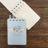 Alex Clark Welcoming Westies Dogs Small Spiral Notepad on a wooden table