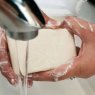 The English Soap Company Vintage Bluebell Soap being used to wash hands