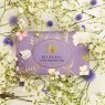 The English Soap Company Vintage Bluebell Soap surrounded by flowers