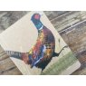Alex Clark Pheasant Small Kraft Notebook close up on a wooden table