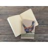 Alex Clark Pheasant Small Kraft Notebook close up on a wooden table