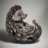 Edge Sculptures Hedgehog Figure side angle on a grey background