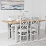 Derwent Grey 1.2m Table and 4 Fabric Cross Back Chairs lifestyle image of the table and chairs